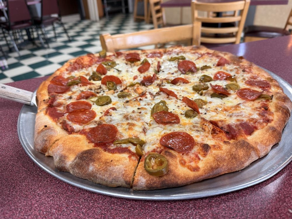Don Carmelo's Pizzeria Logo