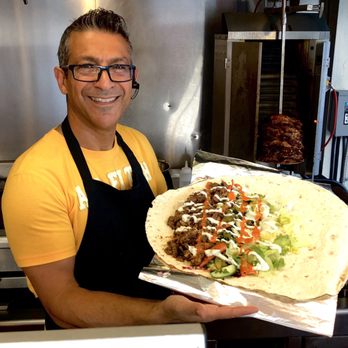 Olive Kebab Restaurant - Owner making my wonderful Lafa. - Mediterranean Near Me - Toronto, Ontario
