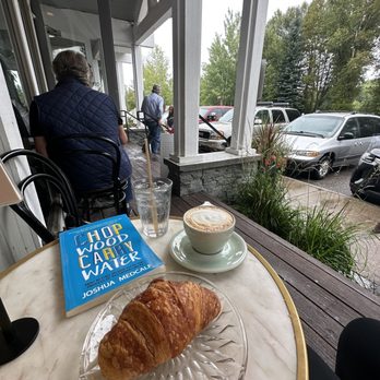 Persephone Bakery - Croissant and cappuccino on the patio - Bakeries Near Me - Wilson, Wyoming Persephone Bakery - Croissant and cappuccino on the patio - Bakeries Near Me - Wilson, Wyoming