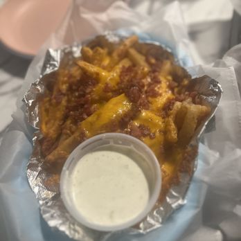 The Brass Monkey - Loaded fries - New American Near Me - St. Pete Beach, Florida The Brass Monkey - Loaded fries - New American Near Me - St. Pete Beach, Florida
