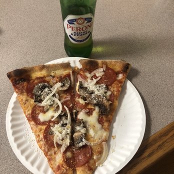 Roma Pizza - a slice of pizza on a paper plate - Pizza Near Me - Atlantic Beach, North Carolina