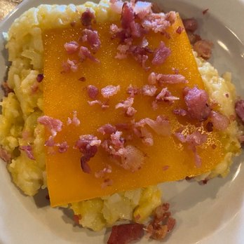 Cracker Barrel Old Country Store - Hash brown casserole...you can see they just slapped a piece of cheese on it and sprinkled with bacon. The cheese wasn't even melted. - Breakfast & Brunch Near Me - Commerce, Georgia