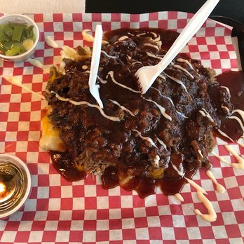 Leon's Smoke Shack BBQ - There it is, a whole "Slap Potato" with chopped brisket.Light on the ranch dressing as requested! Green onions and Jalapenos on the side. - Barbeque Near Me - Tulsa, Oklahoma