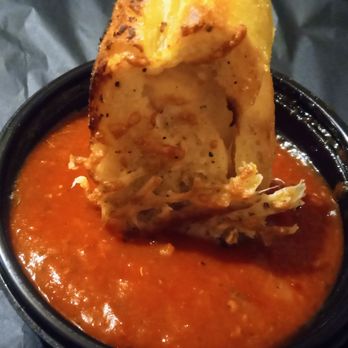 Noodles and Company - Cheesy Garlic Bread dipping in Marinara - Noodles Near Me - Layton, Utah Noodles and Company - Cheesy Garlic Bread dipping in Marinara - Noodles Near Me - Layton, Utah