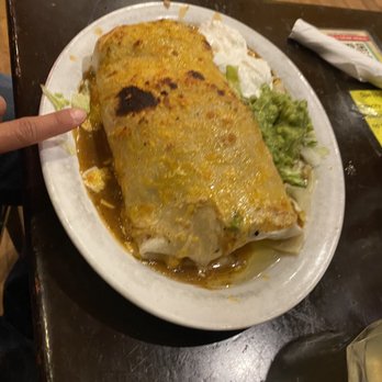 Roberto's Cafe - Burrito, finger for scale - Mexican Near Me - Mammoth Lakes, California Roberto's Cafe - Burrito, finger for scale - Mexican Near Me - Mammoth Lakes, California
