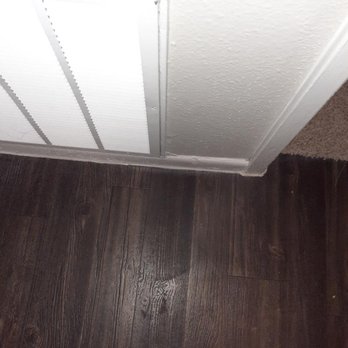Ashmore Apartments - crack goes from living room to both hallways. - Apartments Near Me - Pasadena, Texas Ashmore Apartments - crack goes from living room to both hallways. - Apartments Near Me - Pasadena, Texas