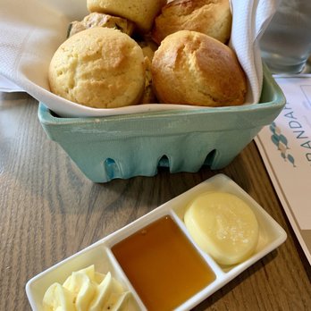 Verandah - Complimentary cornbread and scones served with honey and butters. - Seafood Near Me - Amelia Island, Florida Verandah - Complimentary cornbread and scones served with honey and butters. - Seafood Near Me - Amelia Island, Florida