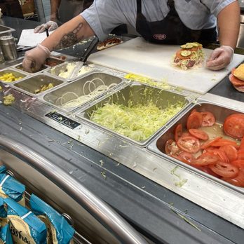 Jersey Mike's Subs - a man preparing food - Sandwiches Near Me - Surprise, Arizona Jersey Mike's Subs - a man preparing food - Sandwiches Near Me - Surprise, Arizona