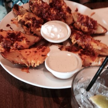 Cheddar's Scratch Kitchen - Loaded potato skins - American Near Me - San Antonio, Texas Cheddar's Scratch Kitchen - Loaded potato skins - American Near Me - San Antonio, Texas
