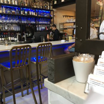 160 Main - Bartender with two guests at bar. - Italian Near Me - Northville, Michigan