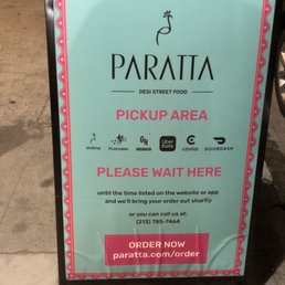 Curbside pickup: When you get there, call the number on this board instead of the one on yelp so someone can bring your food out.