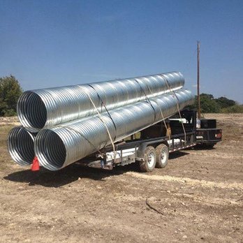 Amyx Contracting - a truck carrying a large pipe - General Contractors Near Me - Florence , Texas Amyx Contracting - a truck carrying a large pipe - General Contractors Near Me - Florence , Texas