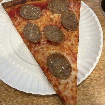 Mikey's Pizzeria - Pizza Slice with Sausage - Pizza Near Me - Raleigh, North Carolina Mikey's Pizzeria - Pizza Slice with Sausage - Pizza Near Me - Raleigh, North Carolina