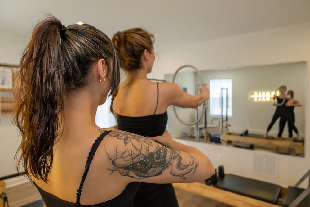 Coreforma Pilates & Strength Studio Logo