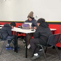 Mathnasium - Mr Reuben and his two hardworking students!