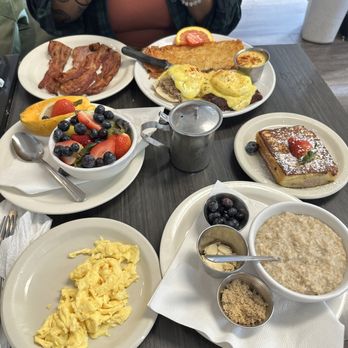 Sweet E's Cafe - Eggs Benedict, fruit platter, blueberry cream cheese French toast, oatmeal, side of eggs and bacon - Cafes Near Me - Honolulu, Hawaii Sweet E's Cafe - Eggs Benedict, fruit platter, blueberry cream cheese French toast, oatmeal, side of eggs and bacon - Cafes Near Me - Honolulu, Hawaii