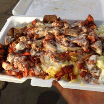 Bhabi Halal Cart - Chicken + Lamb over Rice - Food Trucks Near Me - New York, New York Bhabi Halal Cart - Chicken + Lamb over Rice - Food Trucks Near Me - New York, New York