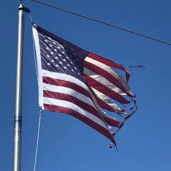Dollar Self Storage - Not how you display the American flag. - Self Storage Near Me - Laveen, Arizona