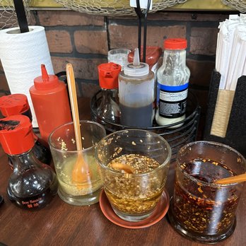 Quan Ba Ky - Complimentary sauces (garlic, fried garlic, chili oil) - Noodles Near Me - Houston, Texas Quan Ba Ky - Complimentary sauces (garlic, fried garlic, chili oil) - Noodles Near Me - Houston, Texas