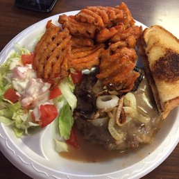 Hamburger steak with sweet potato fries. Hamburger steak with sweet potato fries.