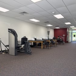 Carolina Physical Therapy and Sports Medicine - Open-concept clinic interior at Rock Hill location, featuring state-of-the-art machines for fall prevention and strength building.