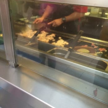 Sansei Japan - Cooking meat on their grill - Sushi Bars Near Me - Downey, California Sansei Japan - Cooking meat on their grill - Sushi Bars Near Me - Downey, California