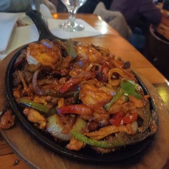 Guadalupe Restaurant - Sizzling  fajitas  mix ( chicken, beef & shrimp ) - Mexican Near Me - New York, New York