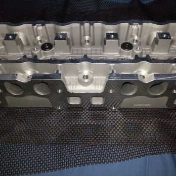 Micron Engine And Machine - New head for Nissan K21/K25 engine in forklift. We service all brands of forklift heads & engines at Micron Engines in Stone Park,IL. Call - Auto Repair Near Me - Stone Park, Illinois