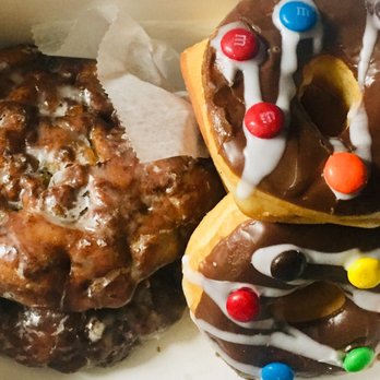 Donut Lovers - Apple fritters and a couple choco glazed with MMs. SUPER FRESH - Donuts Near Me - Plano, Texas Donut Lovers - Apple fritters and a couple choco glazed with MMs. SUPER FRESH - Donuts Near Me - Plano, Texas