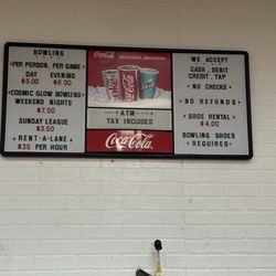 Paris Lanes - Sign with prices.