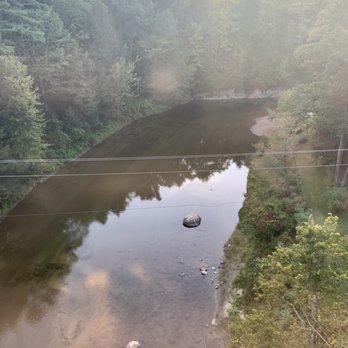 Green Mountain Railroad - a river and a bridge - Tours Near Me