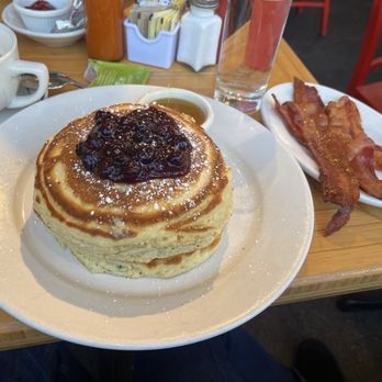 Clinton St. Baking - Pancakes with blueberry compote and a side of bacon. - Bakeries Near Me - New York, New York