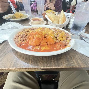 Padilla's Mexican Kitchen - Staff Sopaipillas red chili, beans on the side - New Mexican Cuisine Near Me - Albuquerque, New Mexico