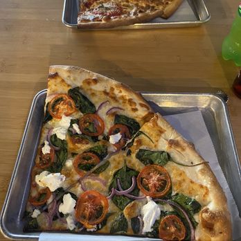 Nexus Pizza - White pizza and margherita pizza slices - Pizza Near Me - Orlando, Florida Nexus Pizza - White pizza and margherita pizza slices - Pizza Near Me - Orlando, Florida