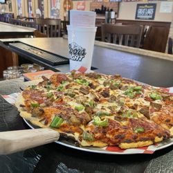 Geppetto's Pizza & Rib House - Pizza thur 5 topping L $13.50. It's great pizza!!