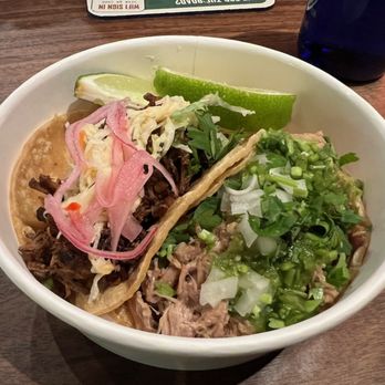 La Esquina - Brisket taco ($5.75) - slow cooked brisket, Mexican slaw, red habanero onions and Carnitas taco ($5.75) - roasted pork, onions, cilantro - Latin American Near Me - New York, New York