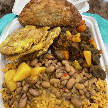The Earthy Kitchen - Yellow rice, pinto beans, tostones, beef-less stew and empanada. - Vegan Near Me - Orlando, Florida The Earthy Kitchen - Yellow rice, pinto beans, tostones, beef-less stew and empanada. - Vegan Near Me - Orlando, Florida