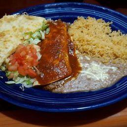 a plate of food with rice and beans
