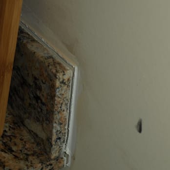 Kt Building Supply - This is our slipping backsplash, that KT will not repair. - Countertop Installation Near Me - Tukwila, Washington Kt Building Supply - This is our slipping backsplash, that KT will not repair. - Countertop Installation Near Me - Tukwila, Washington