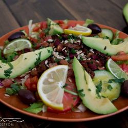 Farbror Nikos café & galleri - Vegan salad with roasted almonds, avocado, Kalamata olives and red beans