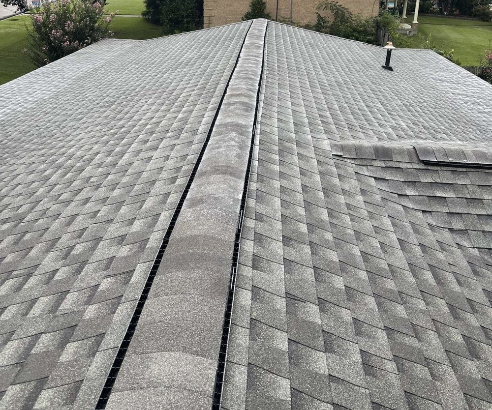 Slide of Akurate Roofing Group