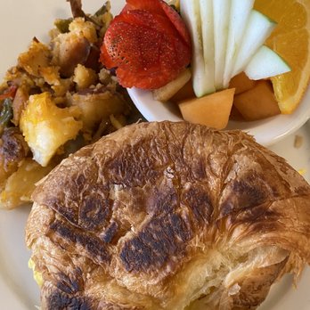 Immigrant Son Caffe - Breakfast sandwich on homemade croissant - New American Near Me - Ventura, California Immigrant Son Caffe - Breakfast sandwich on homemade croissant - New American Near Me - Ventura, California