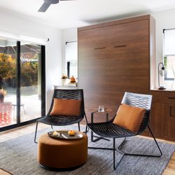 More Space Place - Enjoy your room every day. This custom Murphy bed folds away beautifully, creating a stylish living space when guests are gone.