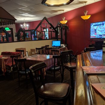 Rose-Thai Restaurant - One of the dining areas facing the bar - Thai Near Me - Toledo, Ohio Rose-Thai Restaurant - One of the dining areas facing the bar - Thai Near Me - Toledo, Ohio