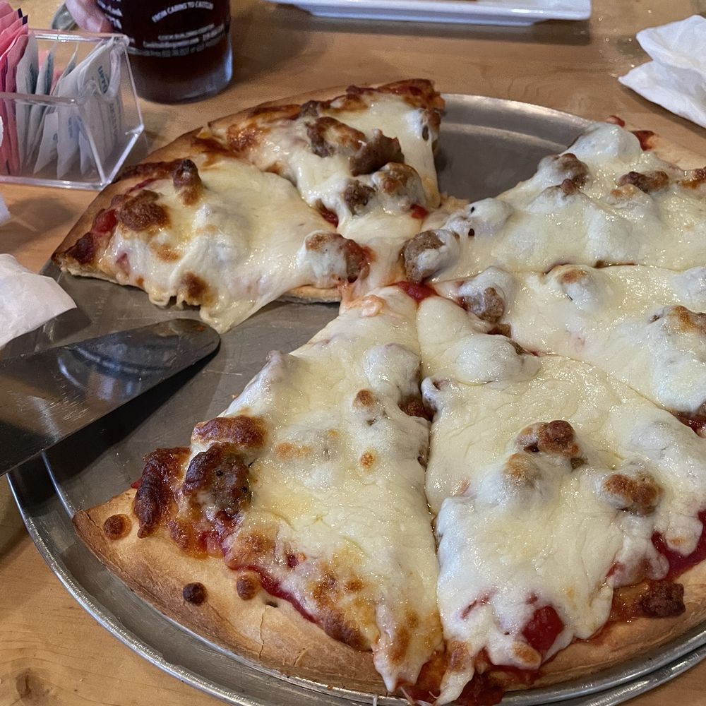 The Landing - Sausage and cheese pizza. Good thin crust, flavorful sausage. - New American Near Me - Cook, Minnesota The Landing - Sausage and cheese pizza. Good thin crust, flavorful sausage. - New American Near Me - Cook, Minnesota