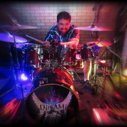 Dinami - "San Man" - Lead Vocals and drummer of Dinami