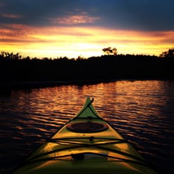 Reach Your Summit - Golden sunset as our group awaits a full moon for moonlight paddling.