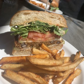 Bella Bru Cafe - 1/2 Garden burger with Swiss cheese, Cajan fries, and magic. - Cafes Near Me - Sacramento, California Bella Bru Cafe - 1/2 Garden burger with Swiss cheese, Cajan fries, and magic. - Cafes Near Me - Sacramento, California