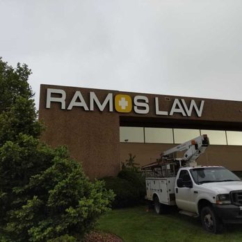 Reflection Signs and Graphics - Channel Letters for Ramos Law in Northglenn - Graphic Design Near Me - Denver, Colorado Reflection Signs and Graphics - Channel Letters for Ramos Law in Northglenn - Graphic Design Near Me - Denver, Colorado