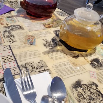 Drink Me! Tea Room - Cheshire Cat tea (on the right) - Tea Rooms Near Me - Tempe, Arizona Drink Me! Tea Room - Cheshire Cat tea (on the right) - Tea Rooms Near Me - Tempe, Arizona